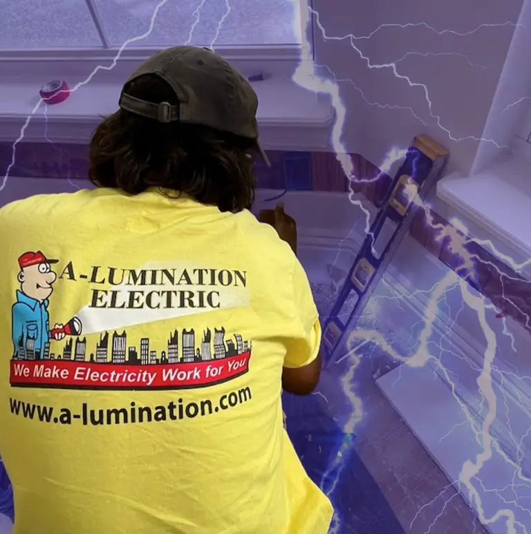 A-Lumination Electric technician at work in a company T-shirt