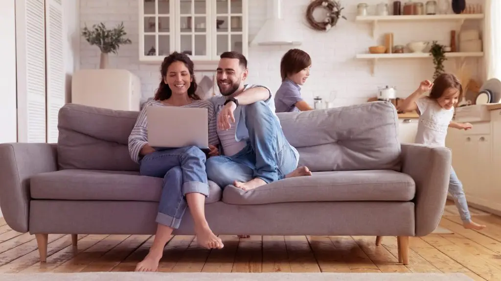 Family relaxing on the living room couch
